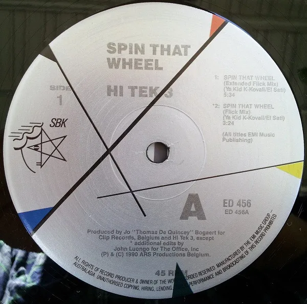 Album cover for Spin That Wheel (Turtles Get Real!) by Hi Tek 3 Featuring Ya Kid K