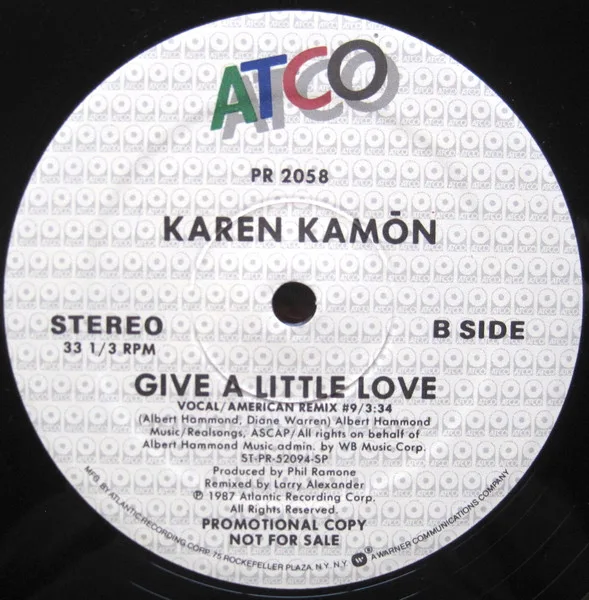 Album cover for Give A Little Love by Karen Kamon