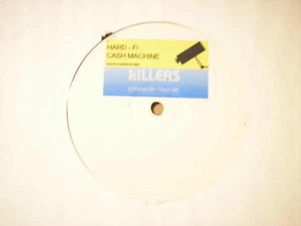 Album cover for Cash Machine / Somebody Told Me (Jakob Carrison Remixes) by Hard-Fi / Killers, The