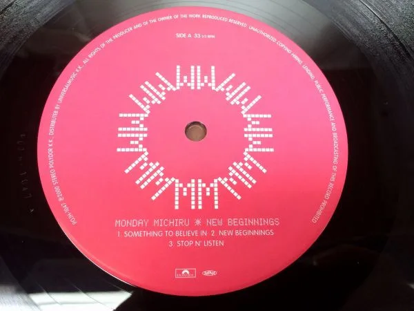 Album cover for New Beginnings by Monday Michiru